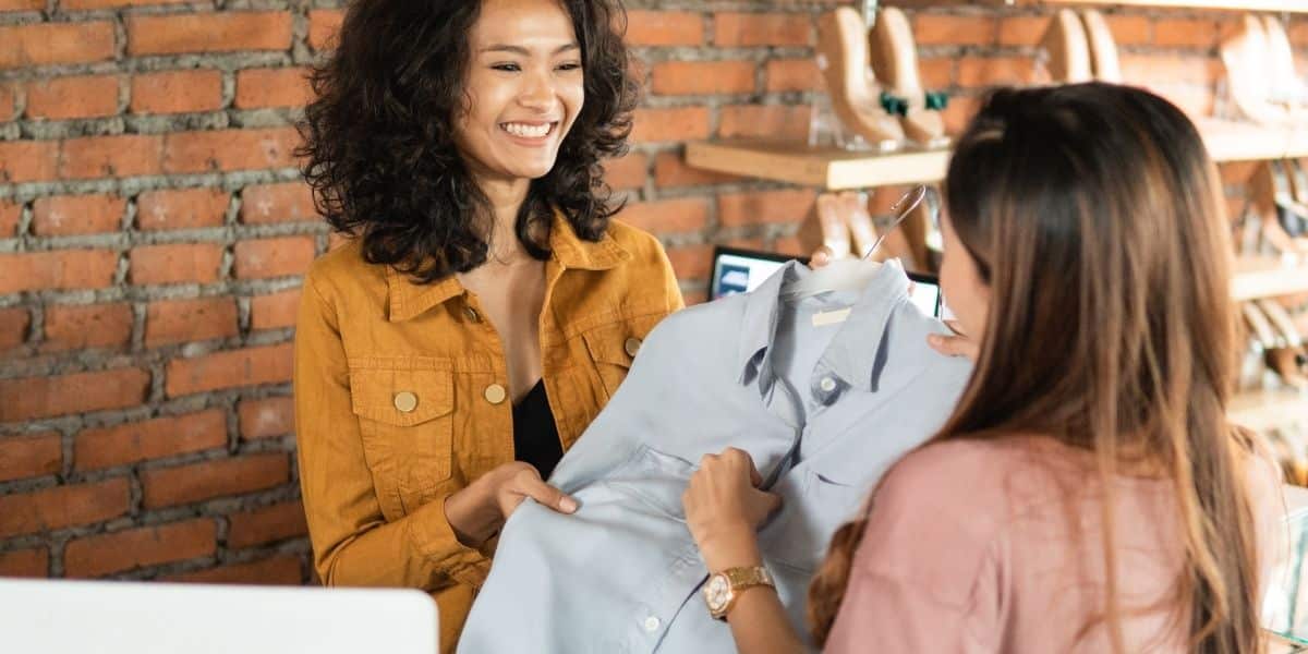 woman buying blouse