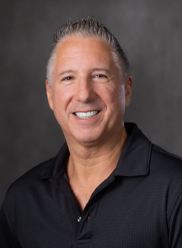 A photograph of Mark Manno.
