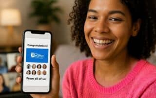 woman holding phone that has an egifter gift card on it with photos from people who contributed to the group gift.